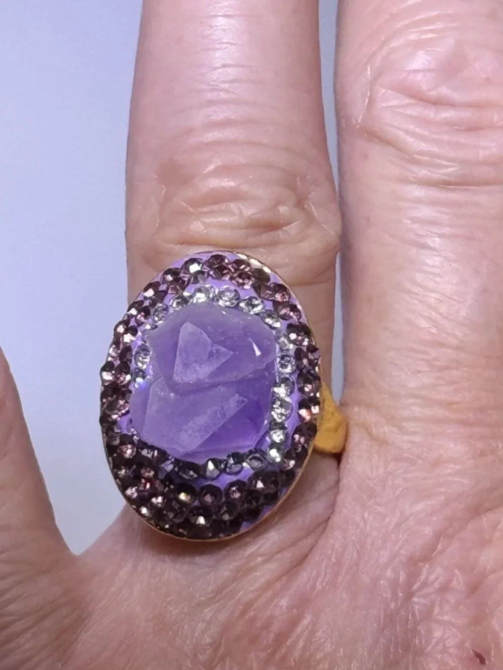 Gold plate fashion ring, NWOT, adjustable, raw Amethyst crystal center, CZs